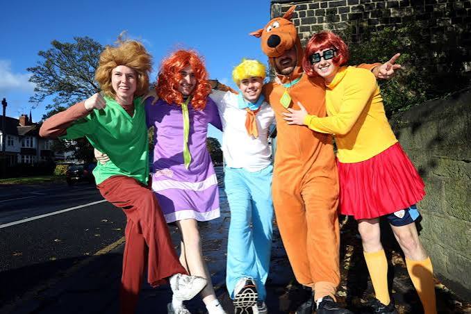 A costumed group mid-way through the Otley Run